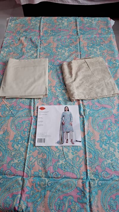 Different branded new lawn suits