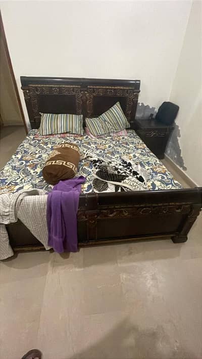 King size bed with two side tables and dressing