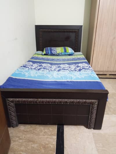 Two single bed with side table and mattress