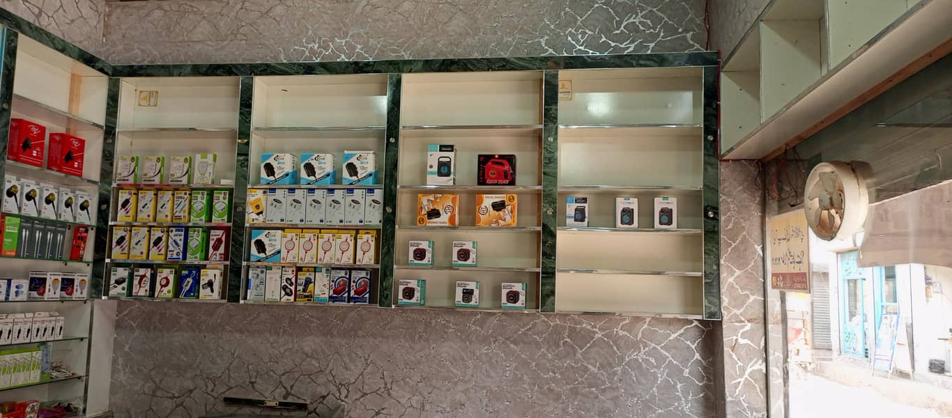 چلتا پھرتا کاروبار اور مکمل سامان فارسیل کاؤنٹر ،الماری،فرنٹ شیشہ 11