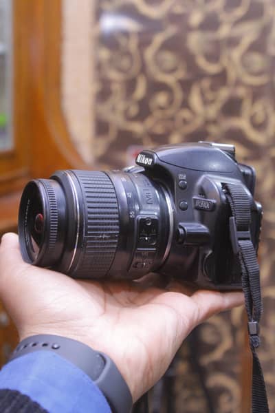 Nikon D3100 with 18 55mm lens