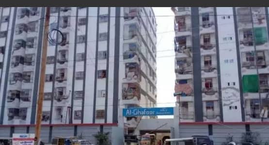2 ROOM 2nd FLOOR FLAT FOR SALE ALGHAFOOR SKY TOWER SECTOR 11A NORTH KARACHI NEW BUILDING LIFT STAND BY GENERATOR CAR PARKING