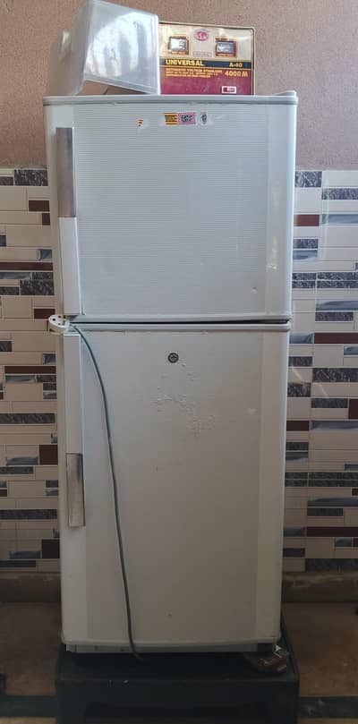 Refrigerator,Medium size,in working condition.