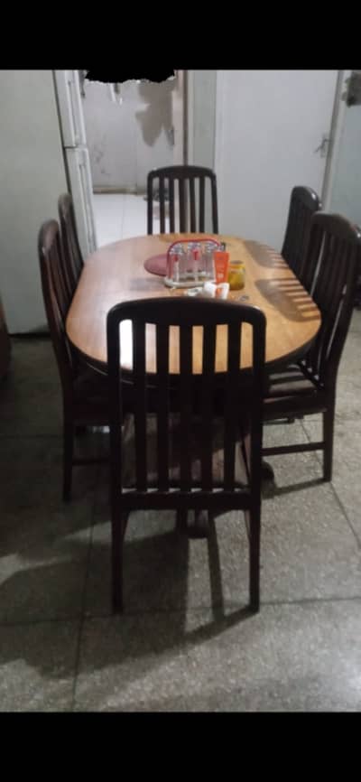 Wooden dining table with 6 chairs