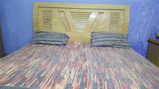 Kingsize bed with mattress,3 door cupboard,1 divider,1 dressing table