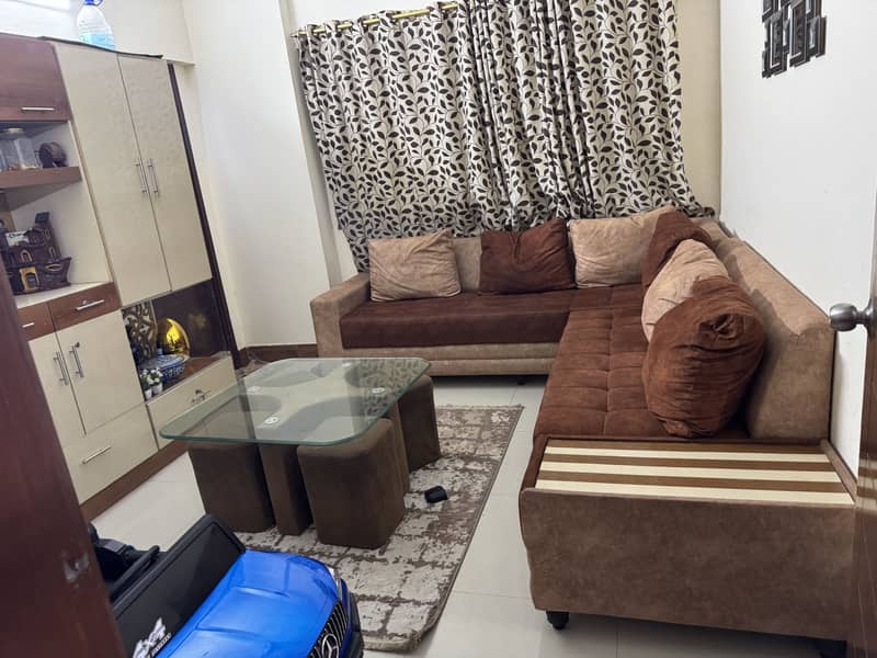 L shaped sofas with table 0