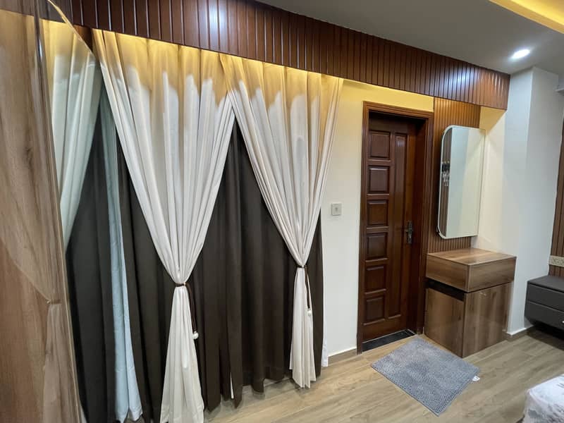 2 BED ATTACHED BATH FULLY FURNISHED ULTRA LUXURY APARTMENT AVAILABLE FOR SALE IN TOPCITY-1 ISLAMABAD 8