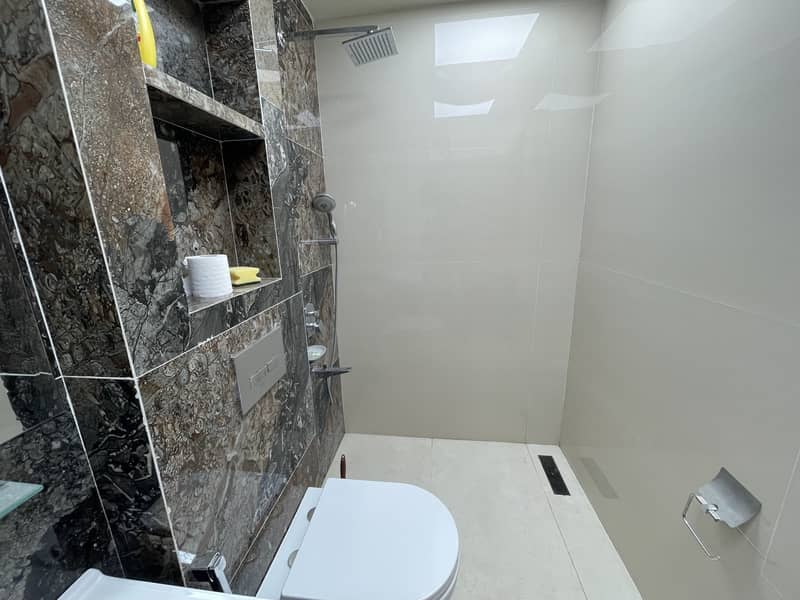 2 BED ATTACHED BATH FULLY FURNISHED ULTRA LUXURY APARTMENT AVAILABLE FOR SALE IN TOPCITY-1 ISLAMABAD 12