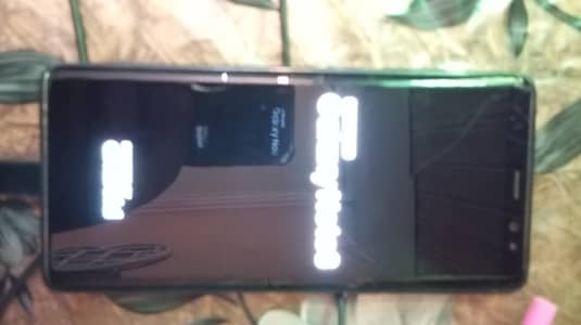 note 8 stuck on logo