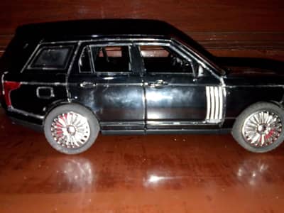 toy car range rover +gun +football+Daram