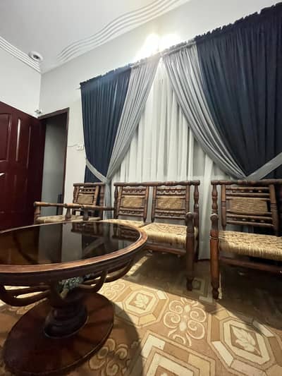 4 person sitting with center table