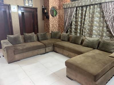 L shaped 9 seater sofa with a day bed