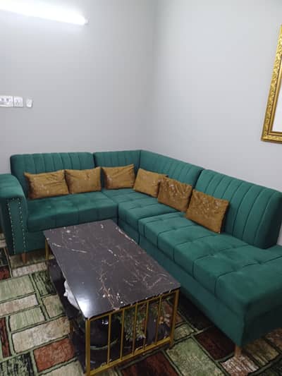 I'm selling my sofa lshape 7 seater With center Table