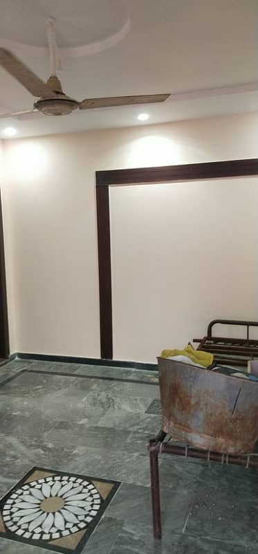 Near Wapda Town Nashman E Iqbal Society 14 Marla Lower Portion Available For Rent