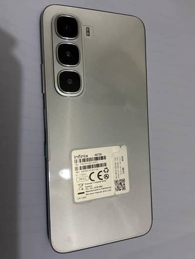 Infinix hot 60i with box and original charger contact me on WhatsApp