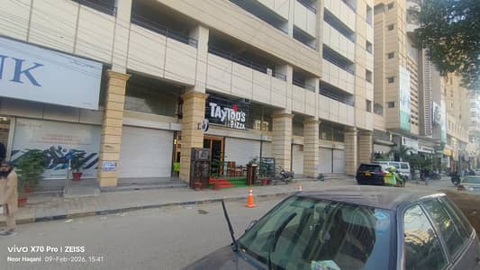 Showroom Commercial Investment Expected Rental Income: 650000 per month MAin Road Facing Oppsite Naheed Super Mart 3-floor showroom in a New Project
