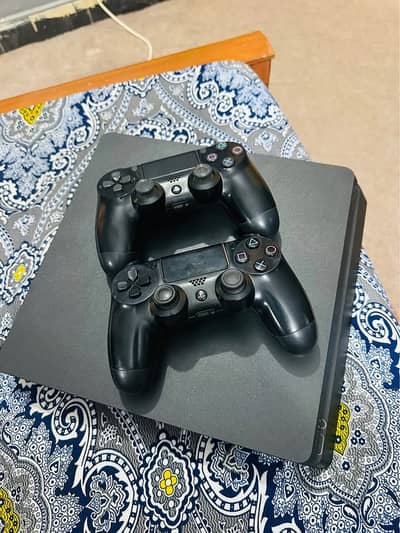 PS4 with 2 Controller and Games