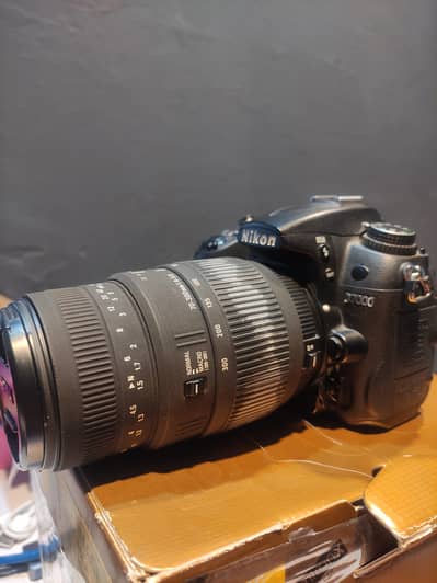 Nikon D7000 with Nikor 50mm lense with Sigma 70-300 mm lense