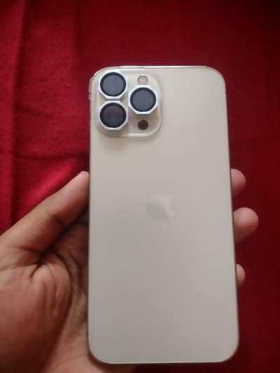 13i phone 13  pro max 10/by 10 condition charger phone golden colour