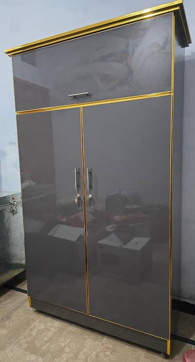 New Cupboard in glossy wooden sheet