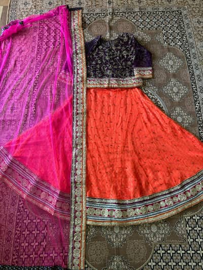 "Elegant Net Lehenga with  embroidery in blush organ and Pink"