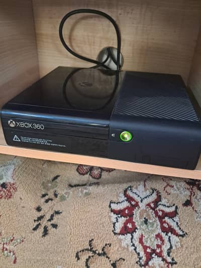 Xbox 360E excellent running condition with controller and 83 games.