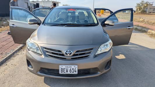 corolla gli 2014 model metallic bronze