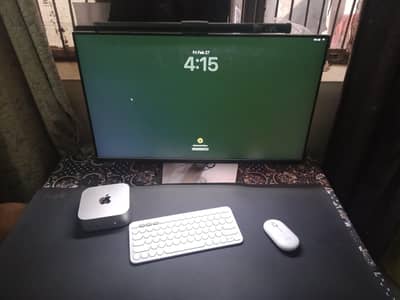 Mac mini m4 + HD monitor + Logitech wireless mouse and keyboard