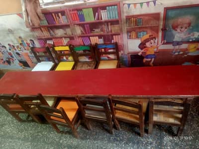 plastic and wooden chairs and a table.