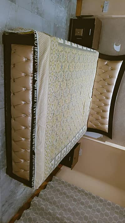 king size bed and 6 seater sofa and showcase