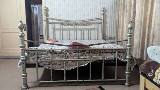 Master bed with complete room set.
