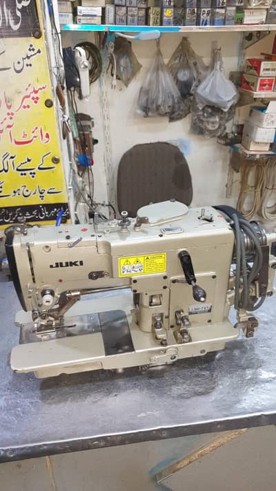 juki 761 kaj Machine.