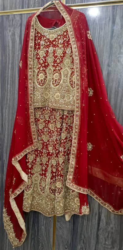 Bridal dress red and golden colour
