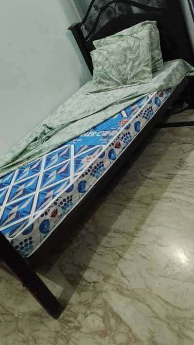 Strong iron frame bed  Only 6 months used, in very good condition