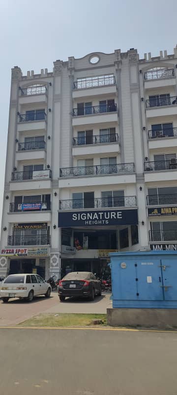 GROUND FLOOR SHOP FOR SALE _FACING MAIN BOULEVARD,IN DREAM GARDENS LAHORE.