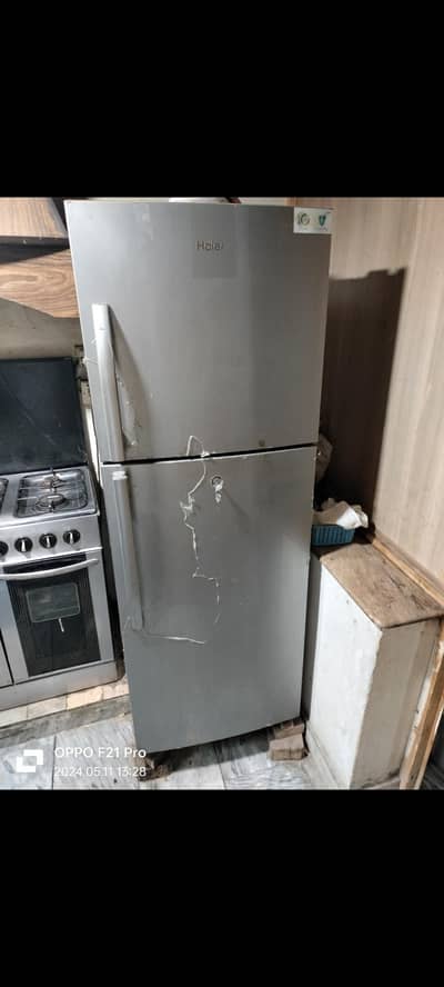 Haier 336 model fridge in good condition origional 14 no size