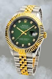 ROLEX DATE JUST  WITH  A GREEN  DIAMOND DIAL , GOLD FLUTED BEZEL .