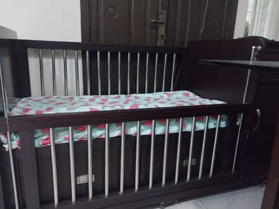 Baby bed with drawers