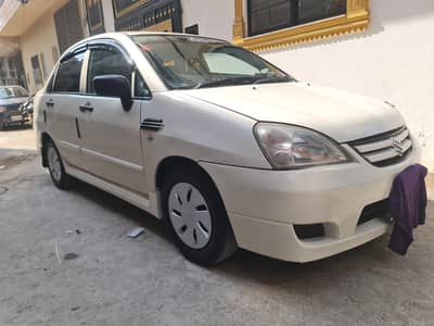 Suzuki Liana Almost genuine 125k kms driven 3rd owner car AC heater on