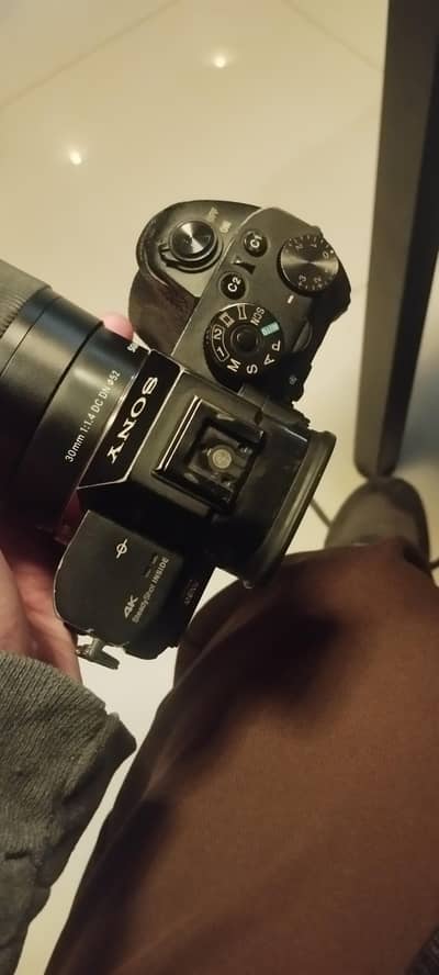 song a7sii Sigma 30 mm 1.4  body price 160k lens price 57k