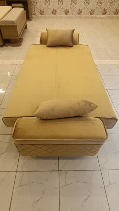 Beige Velvet sofa bed with pillows and Golden Velvet 3-seater sofa