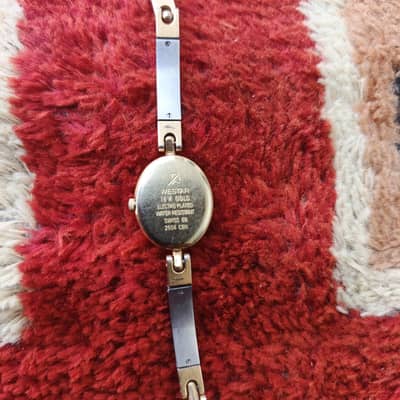 WE START 18 k gold . Swiss Eb 2504 CBN