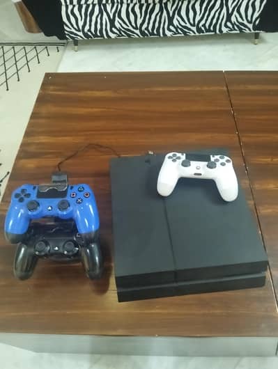 Playstation 4 with 3 controller and charging dock