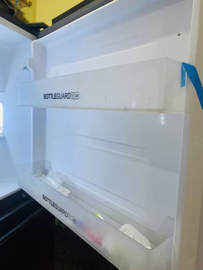 Haier HRF-368IDRA Digital Inverter Red Glass Door Refrigerator.