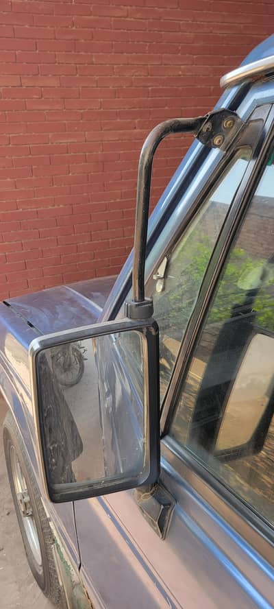pajero 1988 model side mirror front grill and safe gaurd for sell