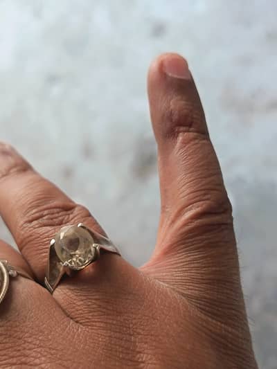 Silver ring with pukhraj stone