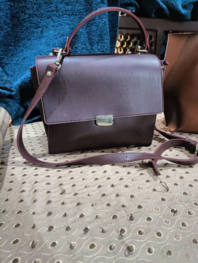 RTW burgundy cross body bag