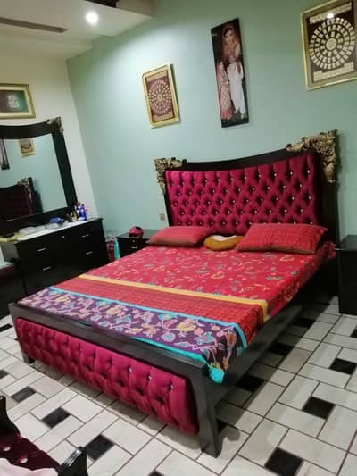 bed with chairs and table