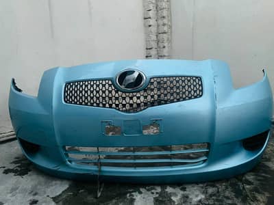 Toyota vitz front bumper (2005-2010) grill included