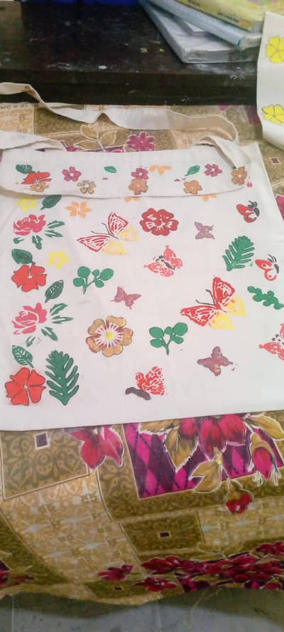 Hand made fabric painting done on bags
